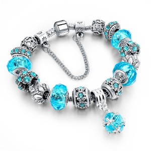 RTD-3851 : Turquois Crystal Charm Bracelet with Flower Charms at Texas Yard Sale . com