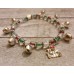 RTD-4012 : Silver Bells Bracelet w/ Festive Christmas Colors and Jingle Bell Charm at Texas Yard Sale . com