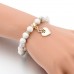 RTD-3855 : White Marble Bead with Heart Charm Bracelet at Texas Yard Sale . com