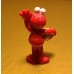 JTD-1064 : Sesame Street Mattel Elmo Holding A Ball and Waving 2009 PVC figure at Texas Yard Sale . com