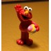 JTD-1064 : Sesame Street Mattel Elmo Holding A Ball and Waving 2009 PVC figure at Texas Yard Sale . com